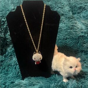 Hello Kitty Gold-tone Crystal Cat Pendant Necklace with Red Accent